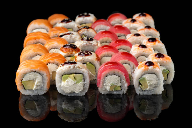 istock Assorted Japanese sushi roll set. sushi rolls set close up selective focus. 1499415752
