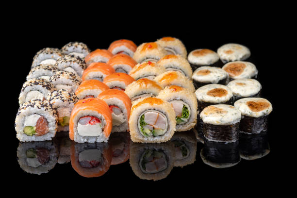 istock Assorted Japanese sushi roll set. sushi rolls set close up selective focus. 1499415765