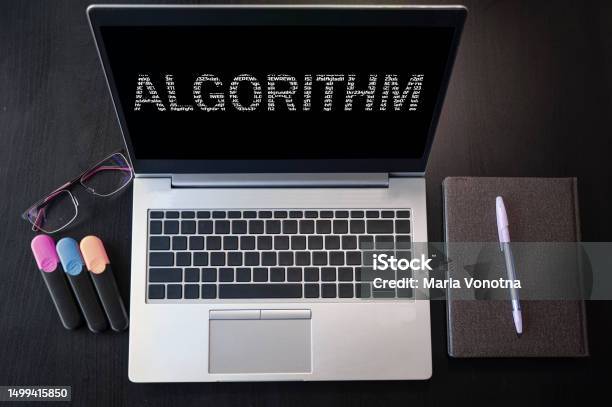 Laptop With Algorithm Text Top View Algorithm Inscription On Laptop Screen Stock Photo - Download Image Now