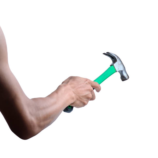 istock Isolated Hand Holding Hammer on White Background 1499416392