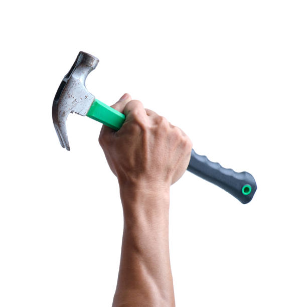 istock Isolated Hand Holding Hammer on White Background 1499416416
