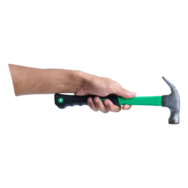 istock Isolated Hand Holding Hammer on White Background 1499416537