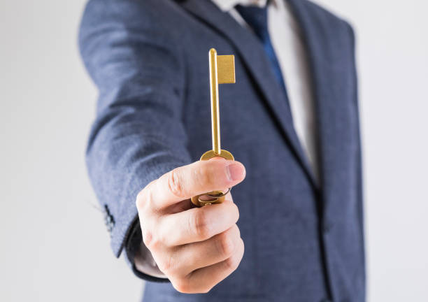 istock Business people with golden keys 1499425769