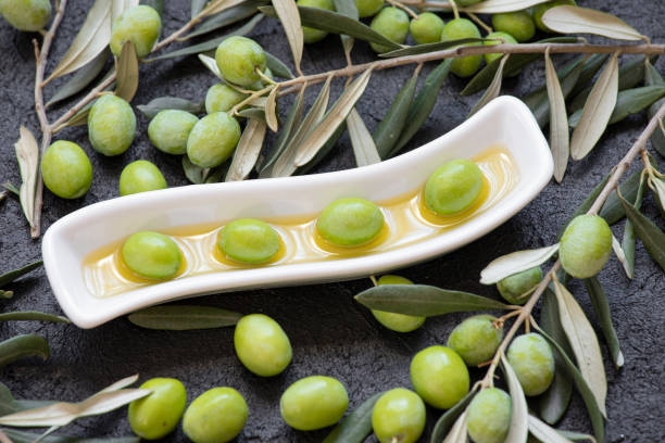 istock Raw olives and olive oil 1499427559