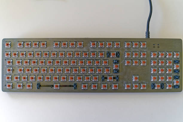 istock High angle view of used dark gray computer keyboard. 1499431024