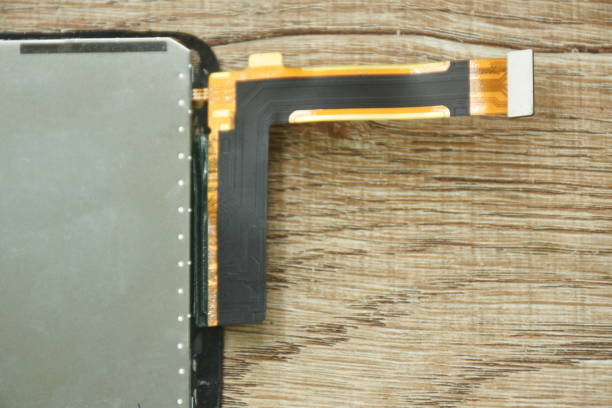 istock flexible flat cable of mobile phone for connect circuit board to device screen on table 1499433277