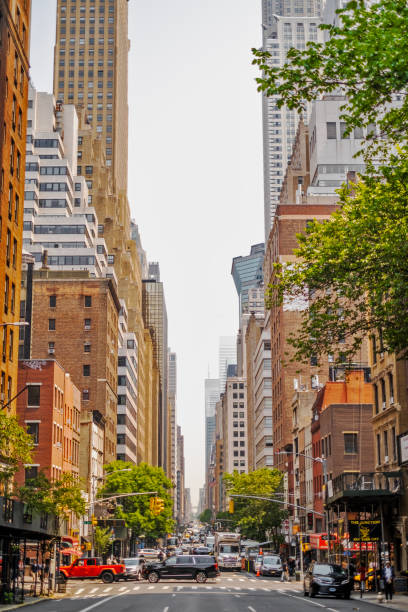 Manhattan, New York City Downtown View with Skyscrapers and Traffic in the Street. stock photo
