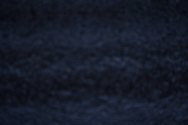 istock Defocus background with asphalt texture. View from above. Blurry paved road, stone texture, black granite gravel background. High quality photo 1499438807