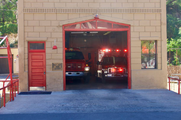 istock Vintage brick fire house with red doors 1499438833