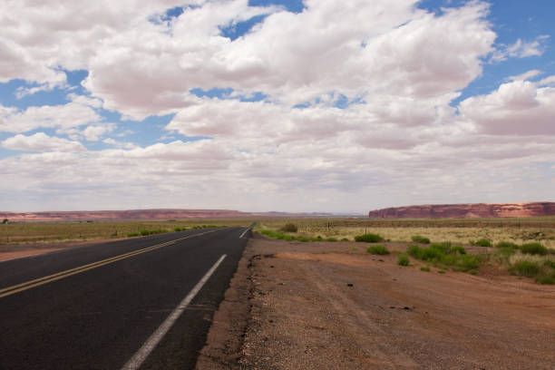 istock Big sky and open road at sunrise 1499439439