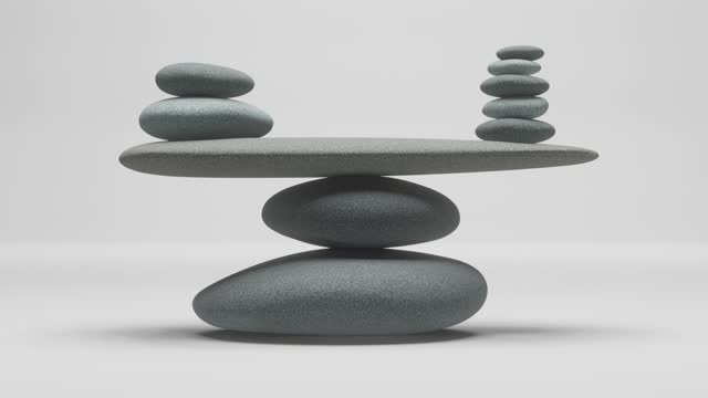 Perfectly balanced stones on white background, harmony concept