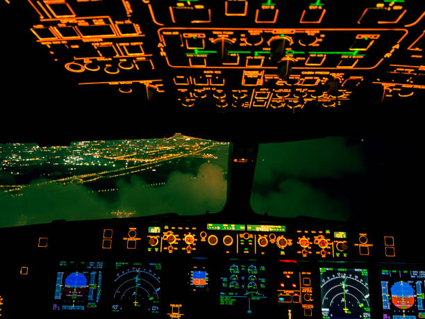 istock cockpit at night when landing horizontal airplane still 1499446944