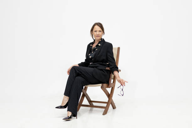 istock A WOMAN ON A CHAIR 1499450810