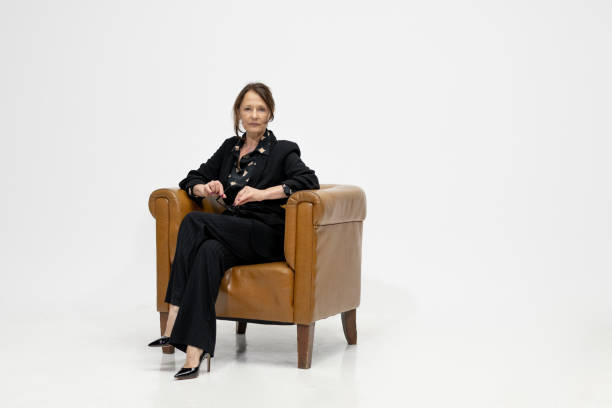 istock A WOMAN ON A CHAIR 1499450814