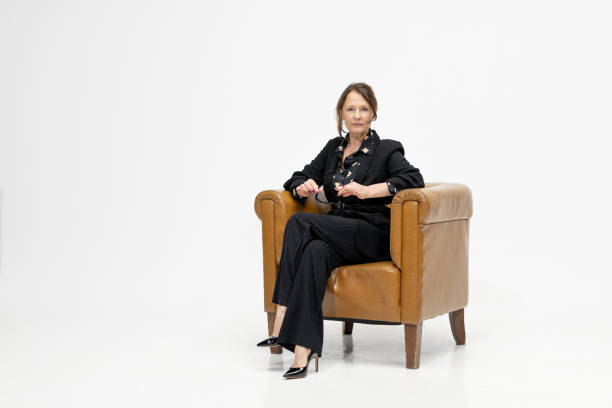 istock A WOMAN ON A CHAIR 1499450819