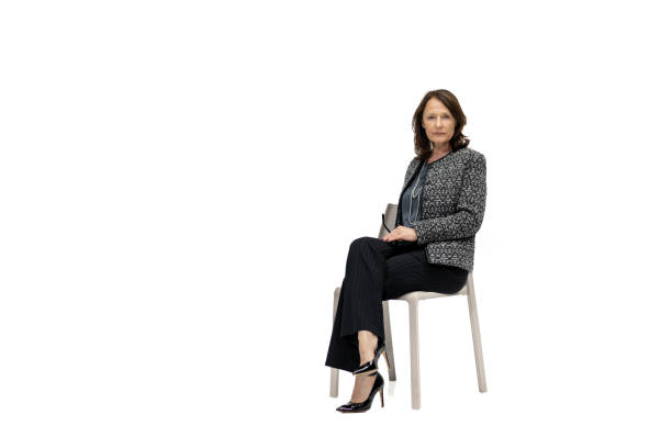 istock A WOMAN ON A CHAIR 1499450821