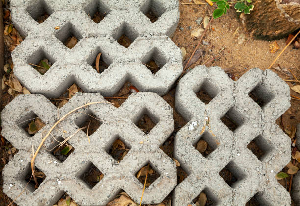 istock Turfstone pavers with holes for grass at a construction site, ready for installment 1499458176