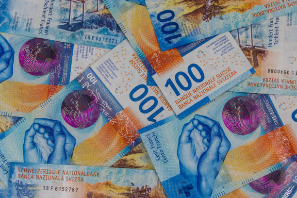 istock Background of one hundred swiss francs banknotes 1499467430