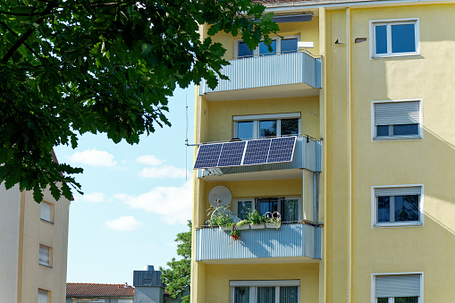 Balcony power plant, private facility for supplying solar energy, photovoltaic elements on a balcony of an apartment building