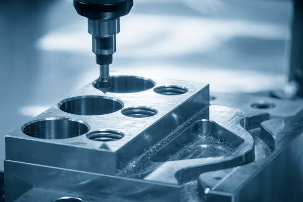 istock The CNC milling machine chamfer cutting mold base part by chamfer tool in the light blue scene. 1499471020