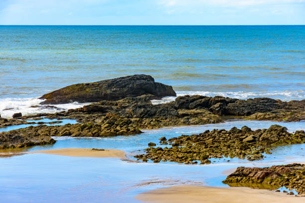 istock Sand between the rocks and the sea at Prainha beach 1499474822