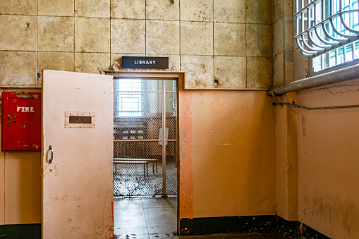 Entrance door to the library of the maximum security federal prison of Alcatraz located in the middle of the San Francisco bay, in the state of California, USA. Jail concept.