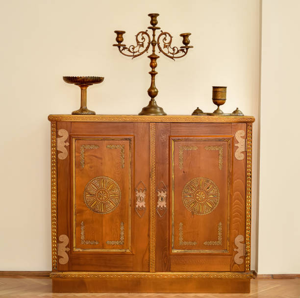 istock Rustic dresser with antique brass candlestick and two dishes 1499477982