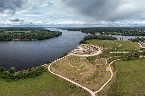 Memorial site Liktendarzs on the banks of the Daugava, Latvia's largest river. View from a drone.