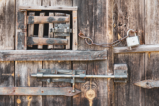 Wintage door locks on wooden rustic door