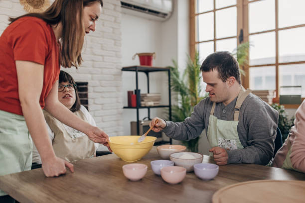 istock People with down syndrome on cooking class 1499483246