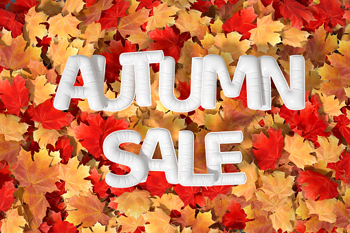 Autumn sale background, autumn leaves with sale balloons, digitally generated image.