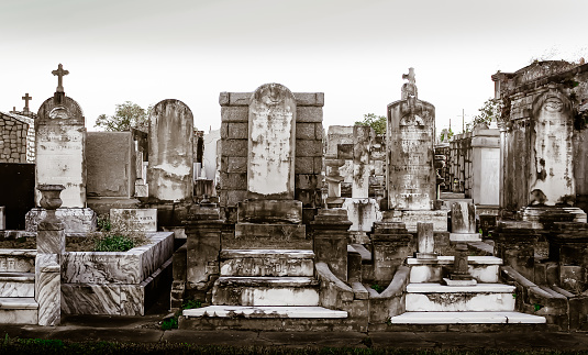 Gravestones in an above-ground cemetery in New Orleans, Louisiana