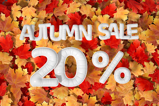 Autumn sale 20 percent, autumn leaves with sale balloons, digitally generated image.
