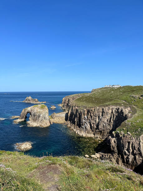 istock Lands end Cornwall coastline. Ents Dodnan arch view. 1499491351