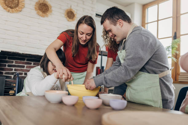 istock People with down syndrome on cooking class 1499491629