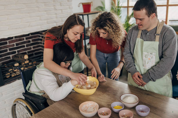istock People with down syndrome on cooking class 1499491806
