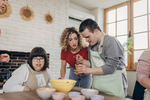 istock People with down syndrome on cooking class 1499491876
