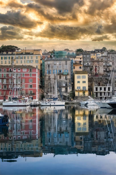 Corsica, Bastia, typical houses in the harbor in summer, sunset
