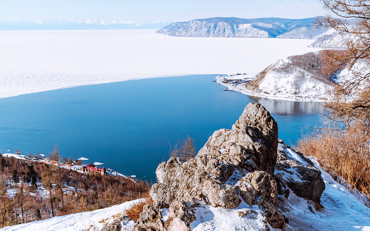 View of the source of the Angara River from Lake Baikal from the observation deck on the Chersky rock. Journey to Siberia for winter Baikal.