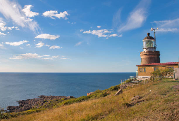 istock a lighthouse on the Swedish coast face to baltic sea under blue sky 1499493656