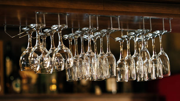 istock Wine glasses hanging in a bar 1499494308