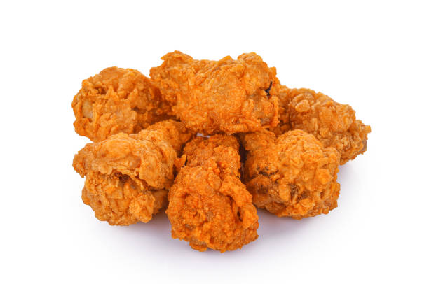 istock Heap of fried spicy chicken isolated on white 1499495388