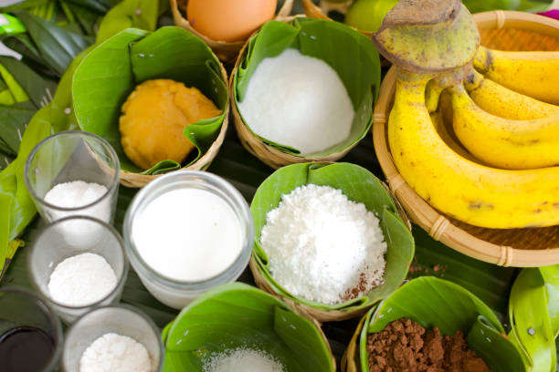 Glasses with ingredients for traditional thai banana based recipe