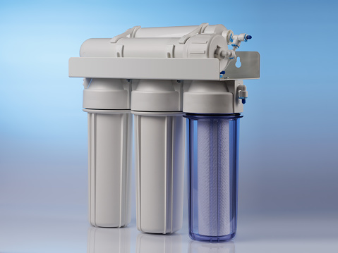 The home reverse osmosis filteration system on a blue background. Watertreatment equipment