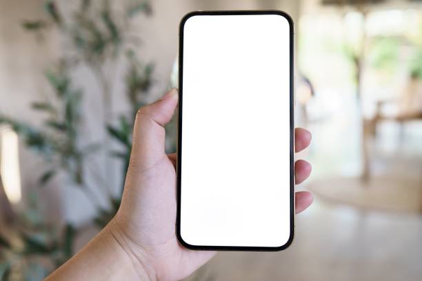 istock Women's hands holding cell telephone blank copy space screen. smartphone with blank white screen isolated. smart phone with technology concept. 1499503883