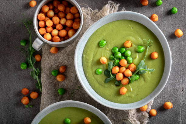 istock Homemade pea soup served with peas puff. 1499513189