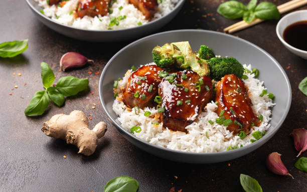 istock Teriyaki Pork Belly with broccoli, spring onion and rice 1499514794