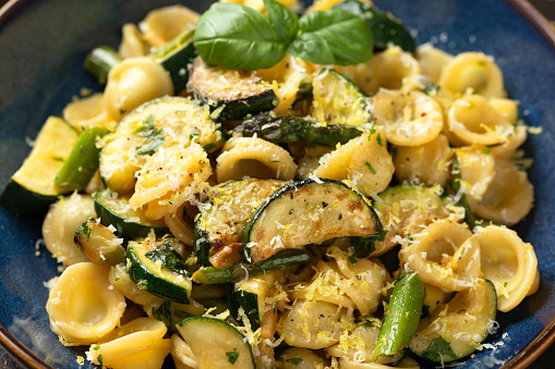 Lemon infused Orecchiette pasta with courgette or zucchini and asparagus.