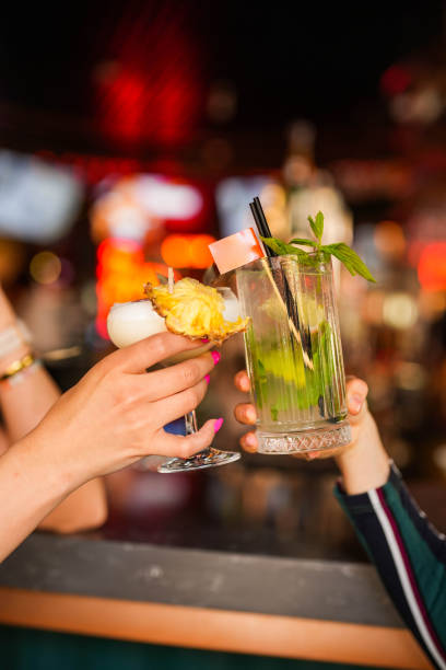 istock getting mojito and cocktail glass on counter at bar 1499518444