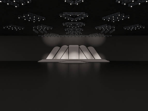 istock Event empty stage with stairs in front view, projection on the backdrop with rounded edges columns design, and a ceiling projector system. custom design. interior hall. 3d rendering illustration 1499518784
